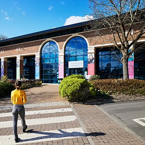 Student walking towards LRC