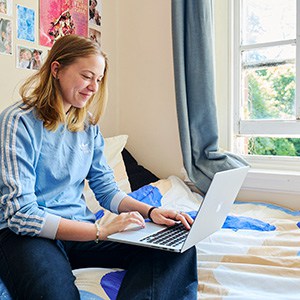 girl studying in her room