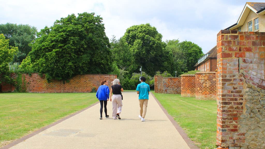 student ambassador giving a tour on an open day