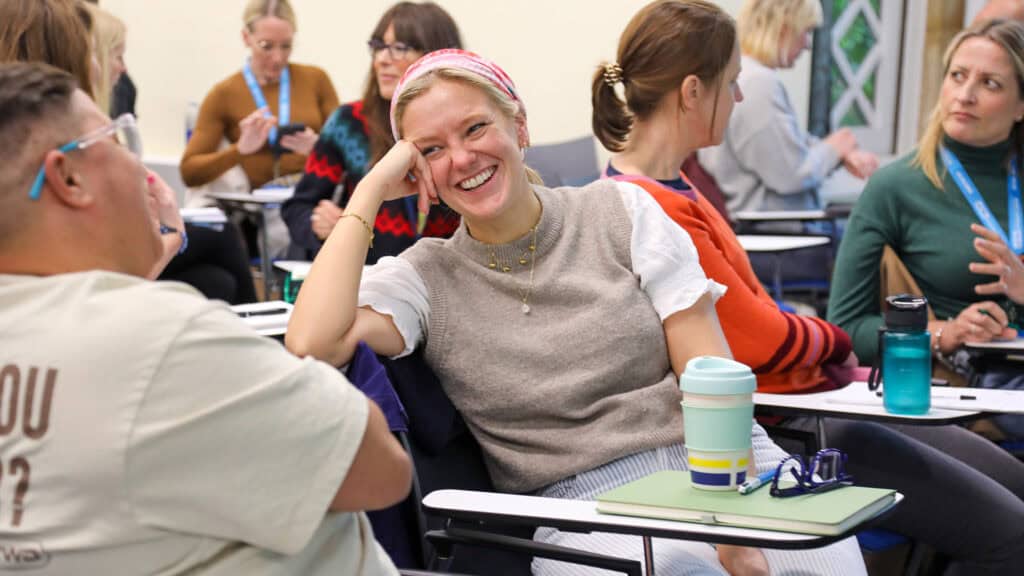 Students engaging in conversation in a counselling class