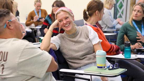 Students engaging in conversation in a counselling class