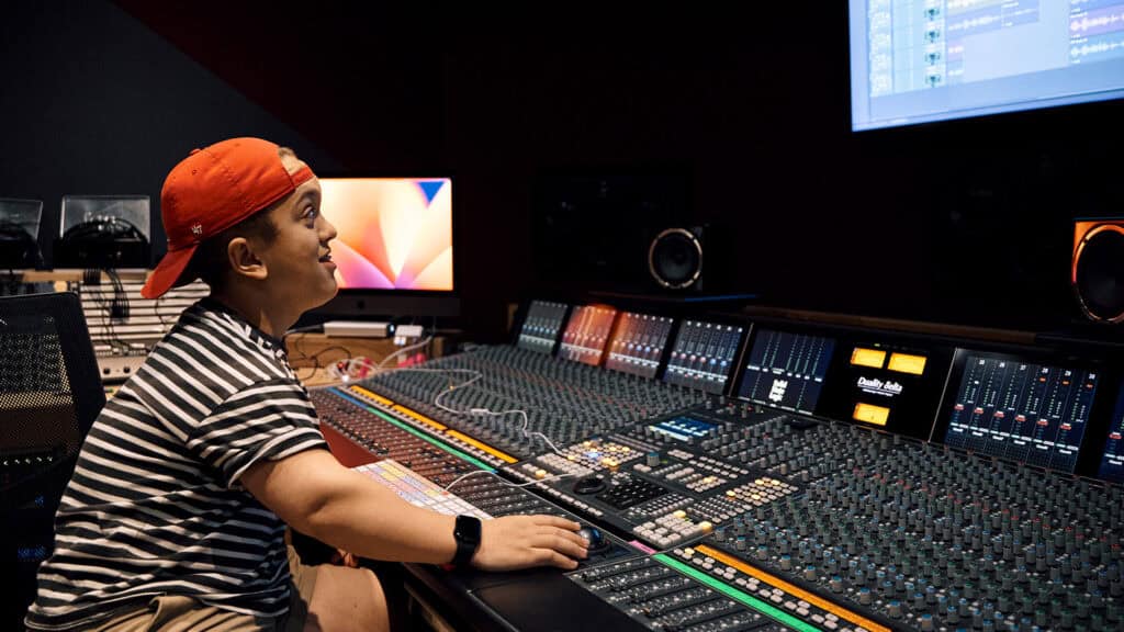 student working in recording studio