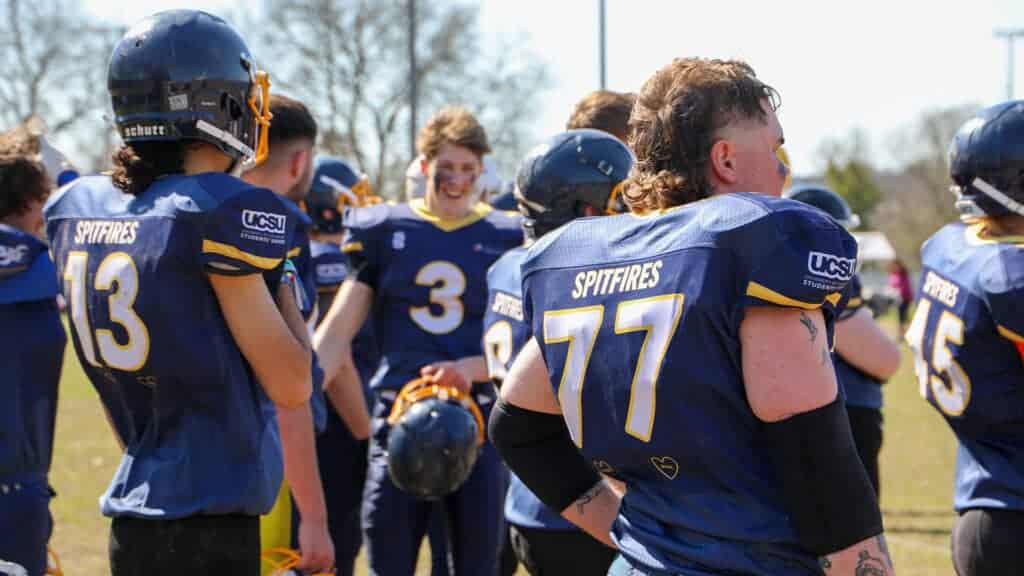 Students playing American Football