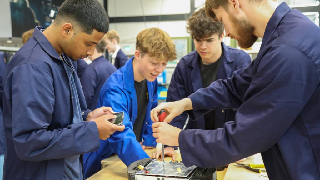 A group of Engineering students participating in Robot Wars