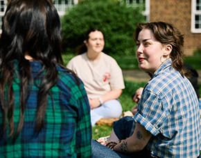 Students sat in Courtyard talking