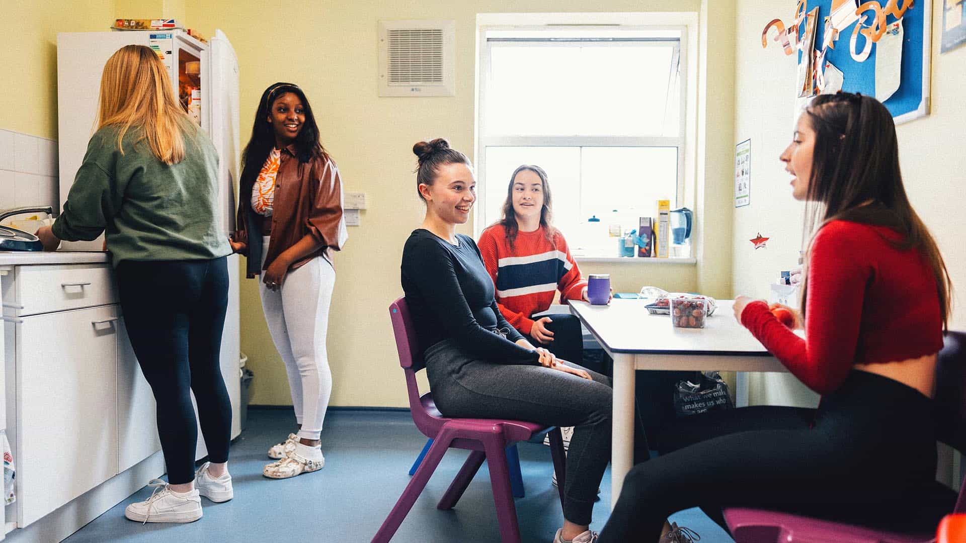 students using kitchen in accommodation