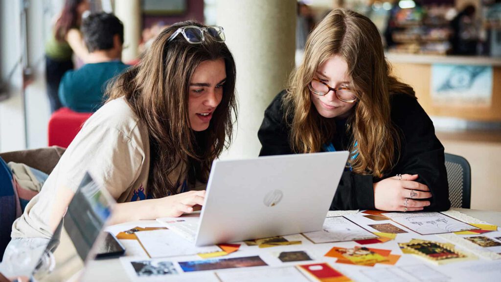 Students working on laptop