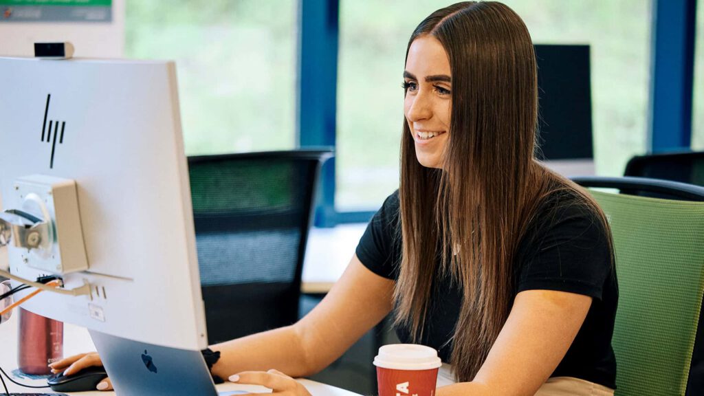 student working on computer
