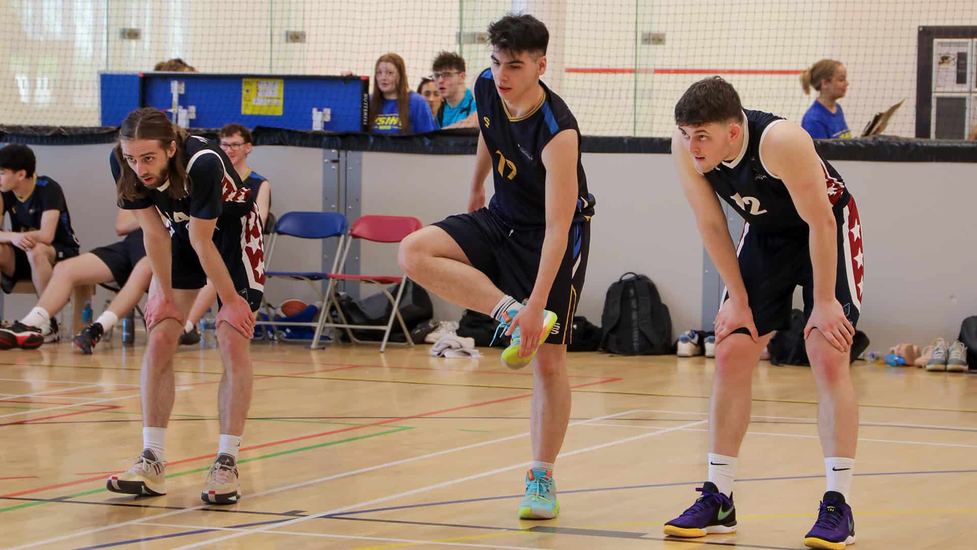 students playing basketball