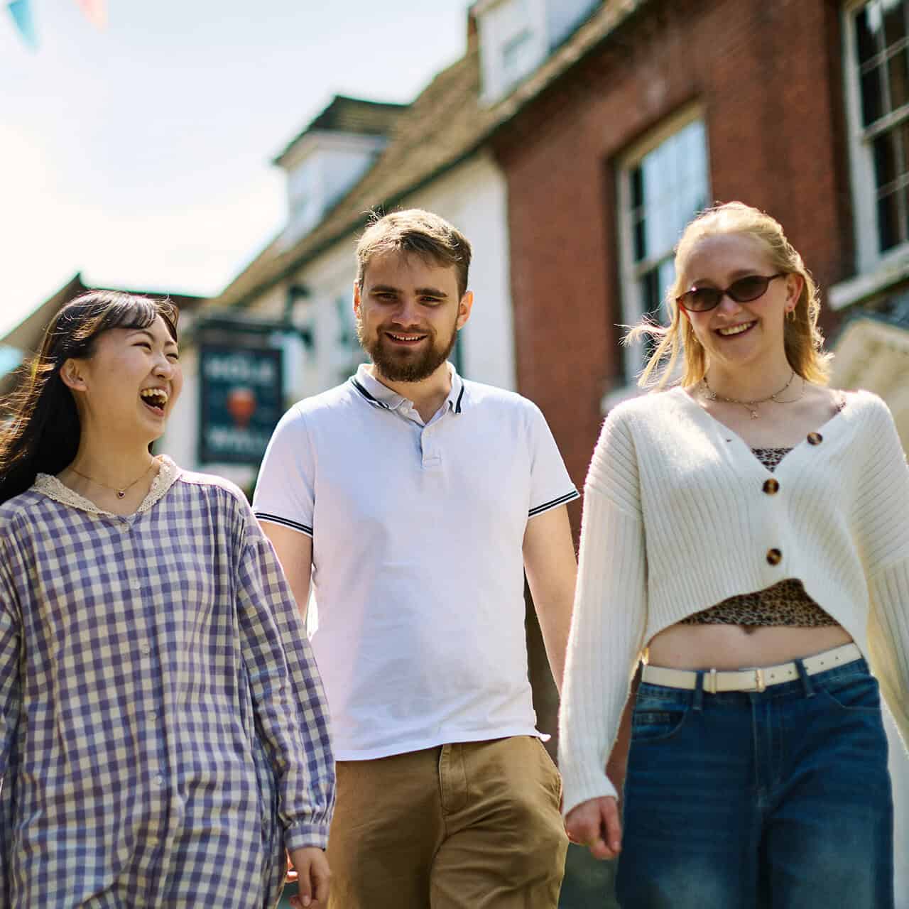 Group of students walking through Chichester town centre